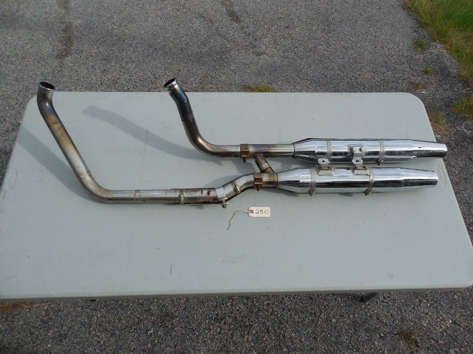 0250 - - Exhaust System Twin Cam Fatboy® Back Side